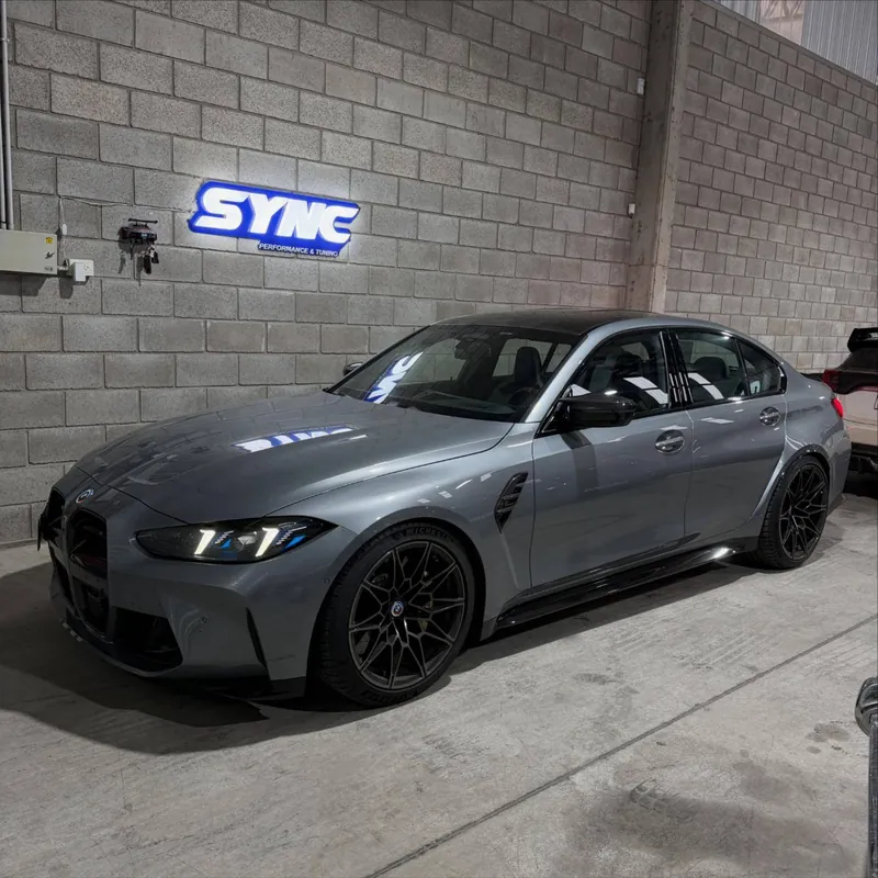 Grey BMW M3 Competition G80 in the workshop