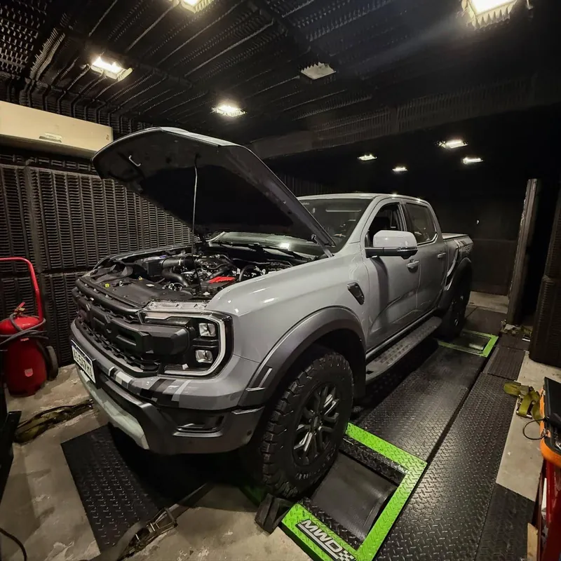 Ford Ranger Raptor V6 with the hood open on the workshop floor